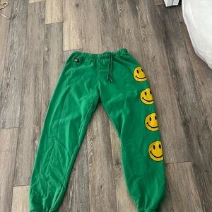 Aviator Nation Green Track Pants with Yellow Smiley Face Detail